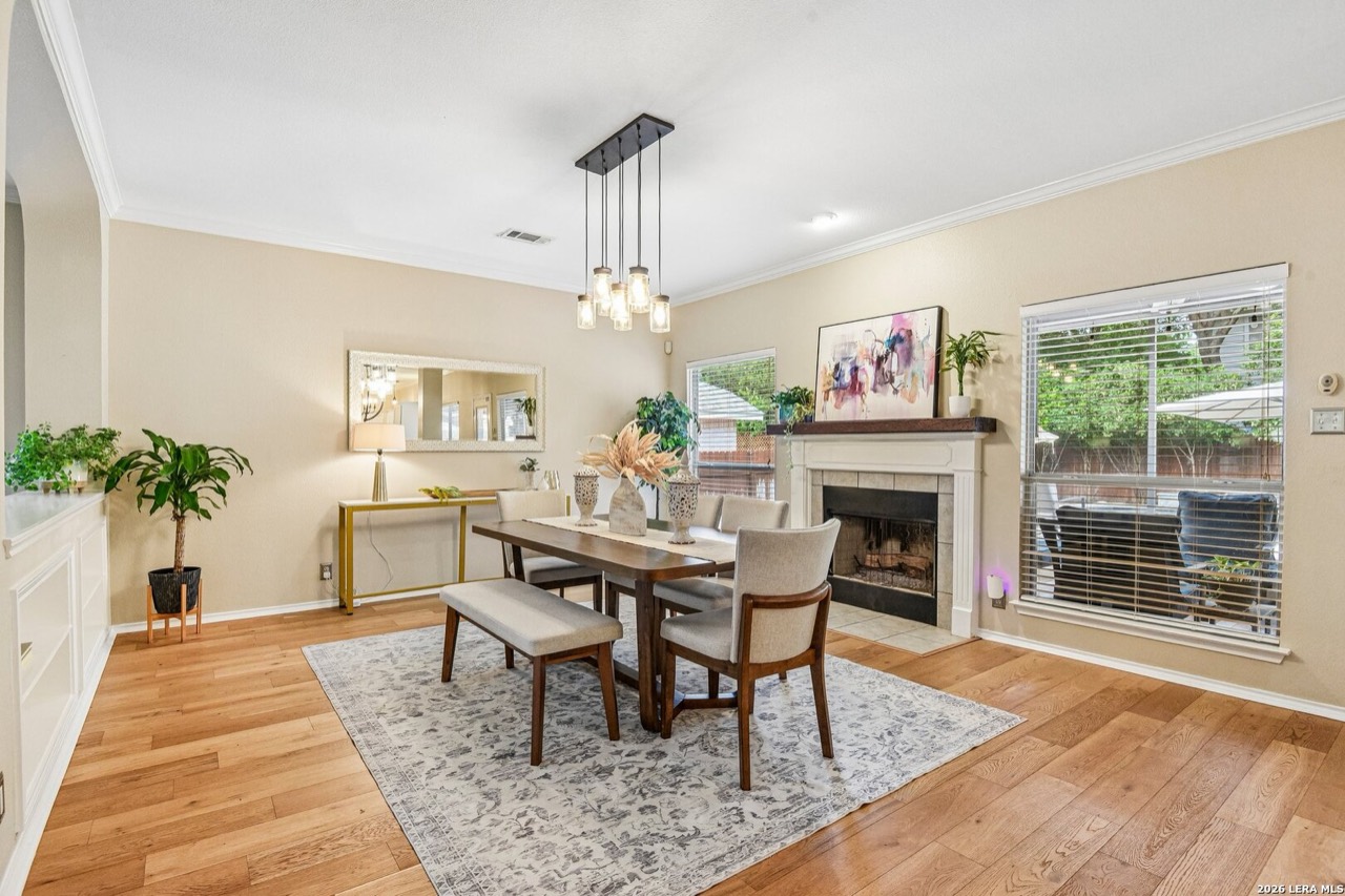 Staged dining room with fireplace at 232 Cordero Dr