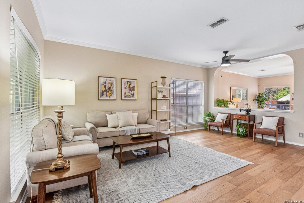 Staged living room with seating area at 232 Cordero Dr